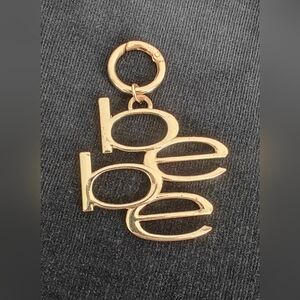 vintage Bebe gold-tone spell-out letter bag charm keychain